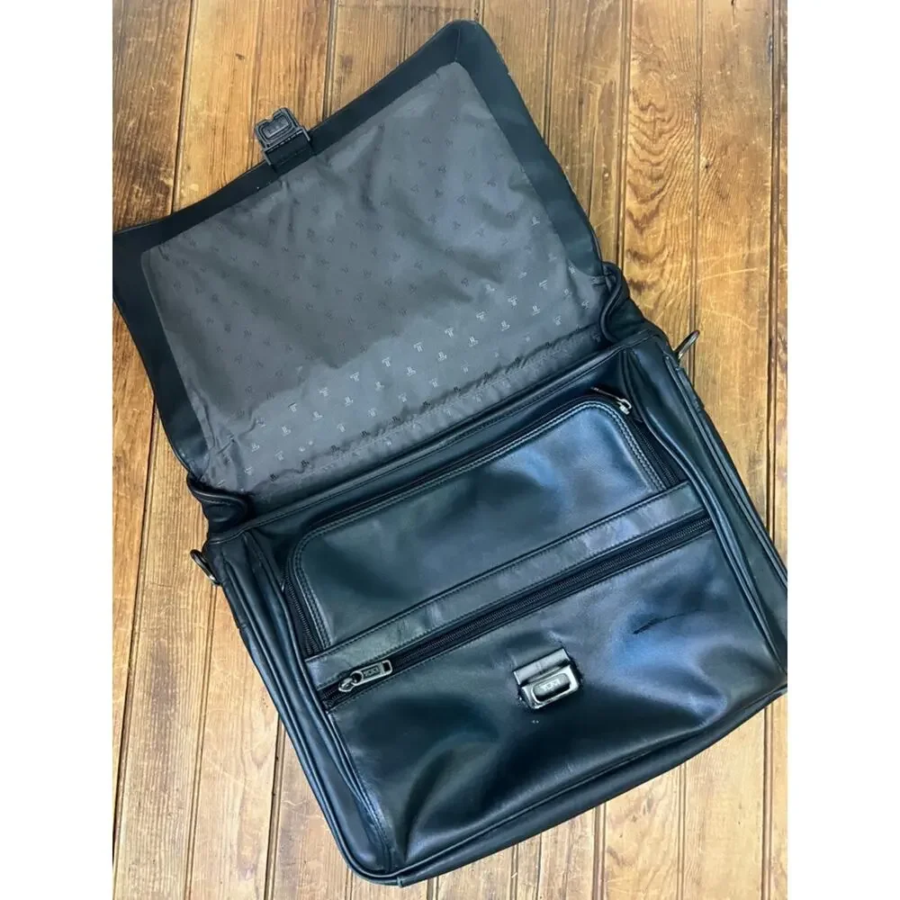 Tumi black leather